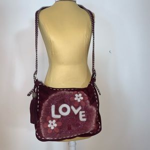 Isabella Fiore suede peace and love crossbody.